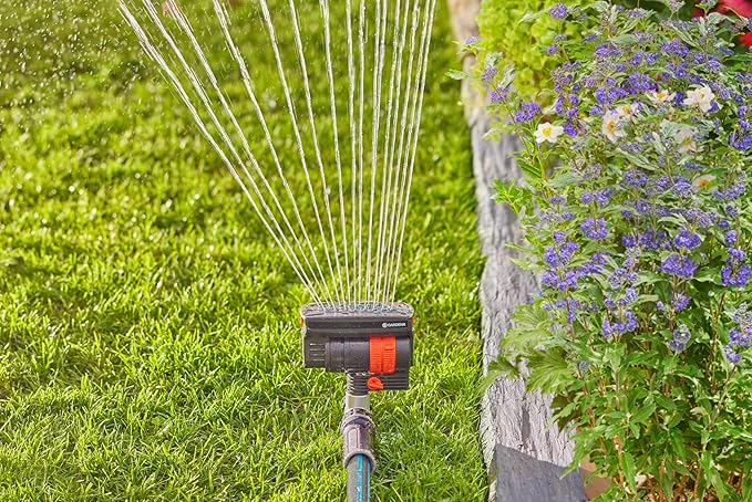 GARDENA 20575 | Up to 2300 sq ft - ZoomMaxx Adjustable Oscillating Sprinkler on Metal Step Spike for Watering Large Area Lawn with US Hose Threads, Yard and Garden. Gardena Quick Connects